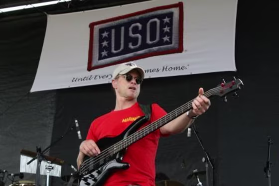 Gary Sinise, a longtime supporter of My Good Deed, plays with the Lt. Dan Band at the Bob Hope Classic Golf Tournament to benefit the USO in Los Angeles on Sept. 11, 2006.
